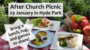 notice for after church picnic with image of picnic spread in the background